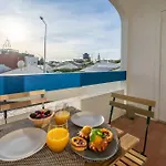 Sunlit Balcony & Open Space Flat By Hostwise