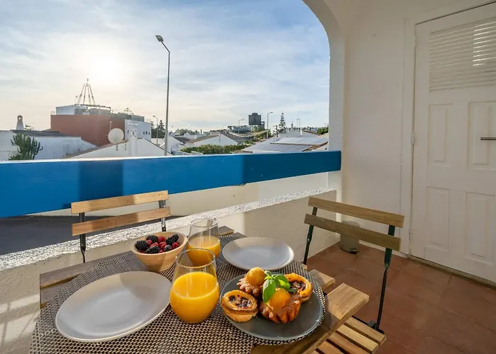 Sunlit Balcony & Open Space Flat By Hostwise